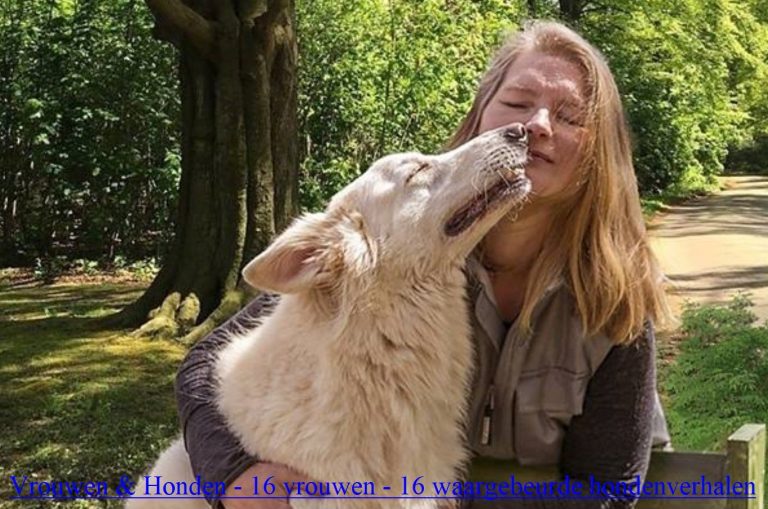 Vrouw en hond tijdens een knuffelmoment